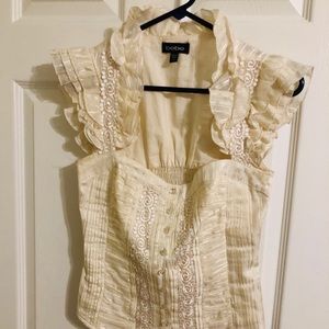Stunning cream colored BEBE top!